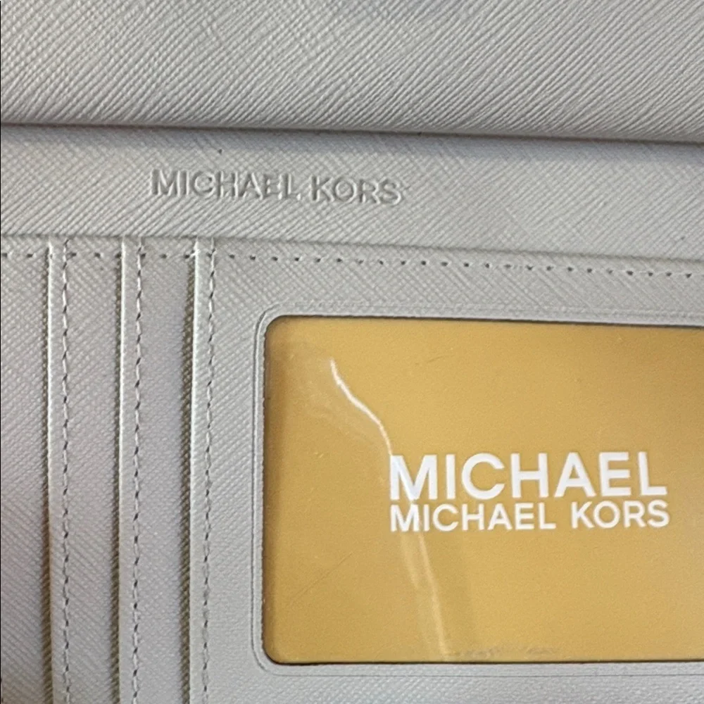 Michael Kors light grey wristlet/wallet